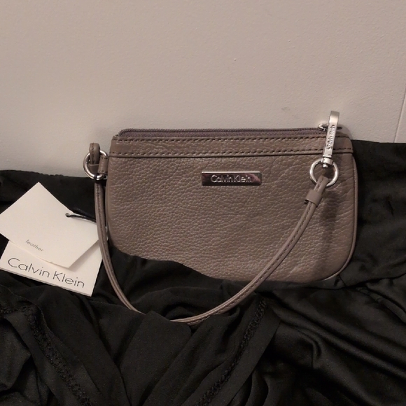 Calvin Klein Handbags - Calvin Klein Gray Leather Wristlet Nwt